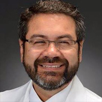 Dr. Carlos Pino