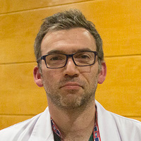 Dr.  Julian Aliste